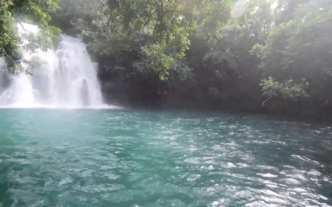 Take a Refreshing Dip at Eau Bleu Waterfall